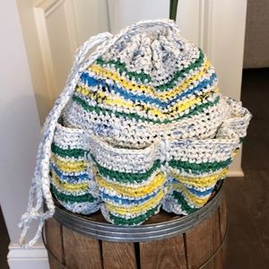 Recycled Drawstring bag with 8 exterior pockets